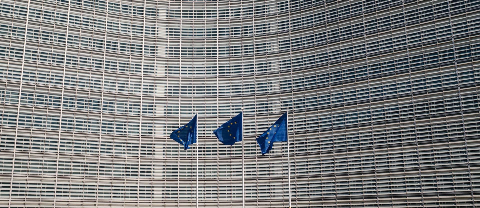 European Union flags outside the European Commission in Brussels.