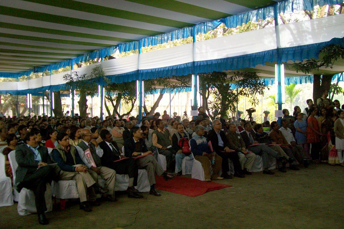Participants listening during an international policy discussion.