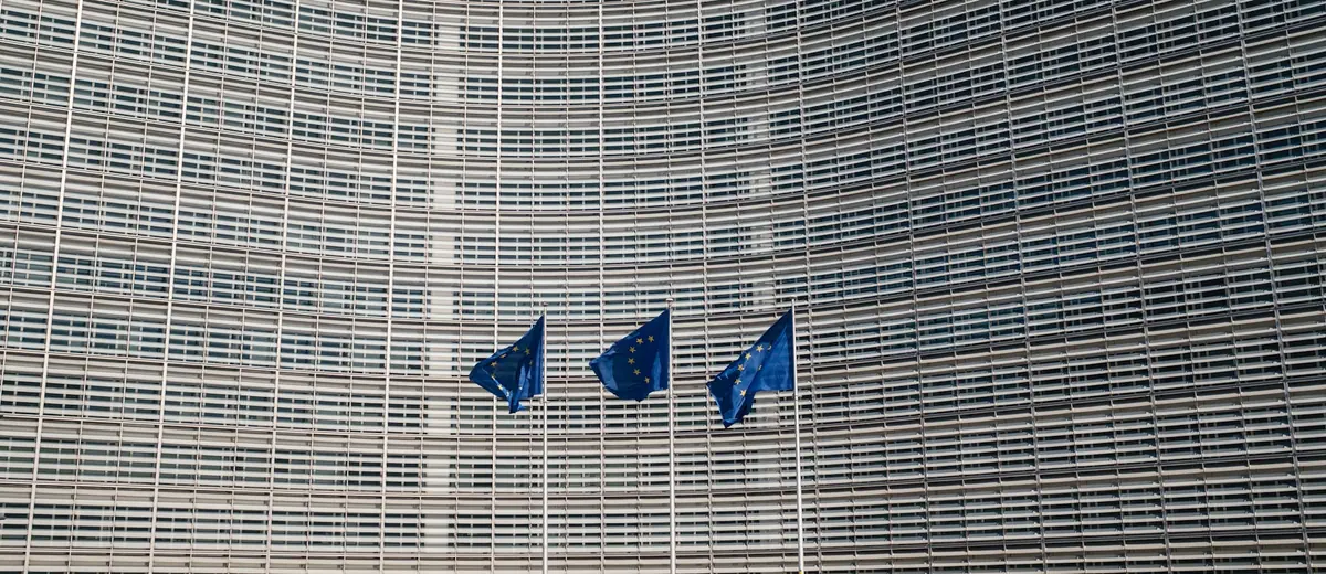 European Union flags outside the European Commission in Brussels.