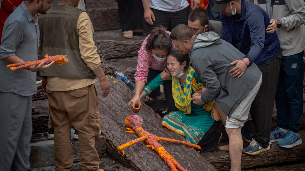 News image for Nepal rescuers delayed by mud and water in tunnels – PM